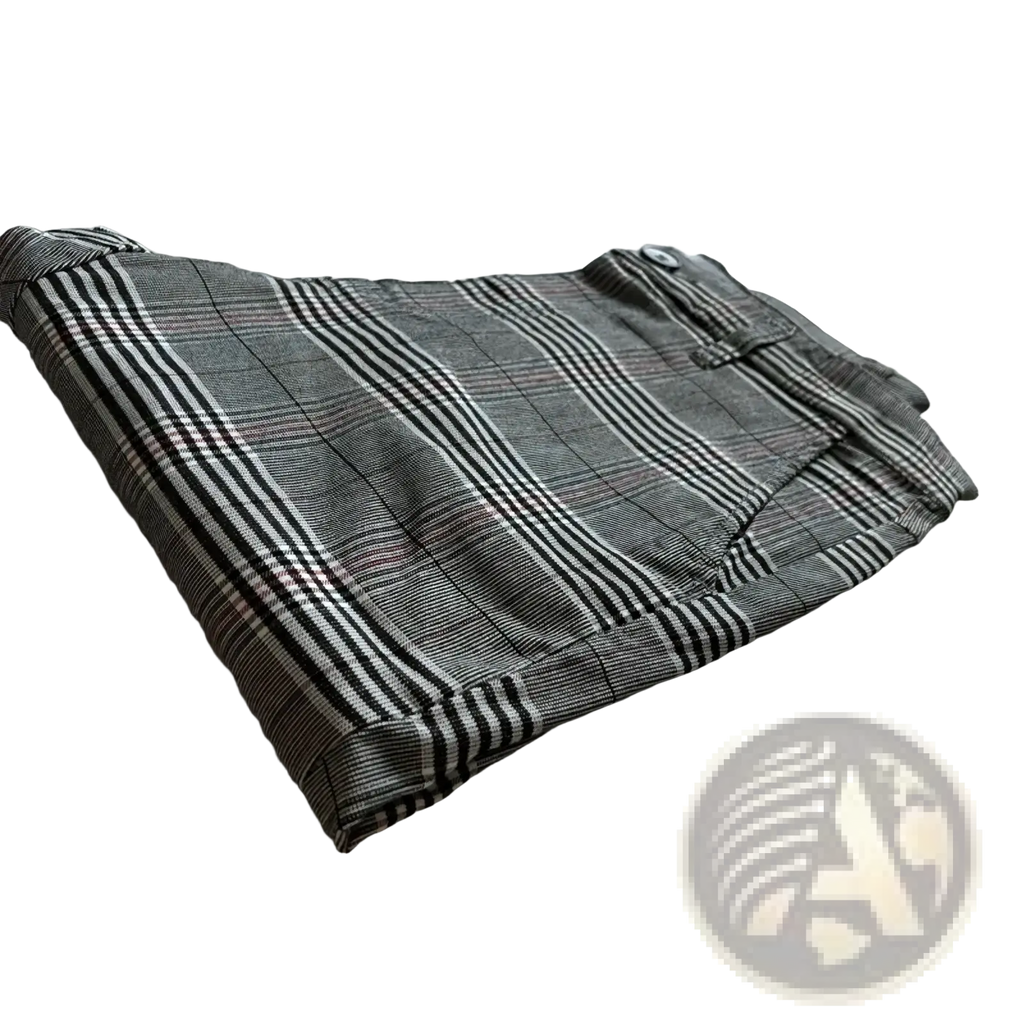 Folded men plaid skinny jogging pants in gray and black with subtle red accents for casual wear