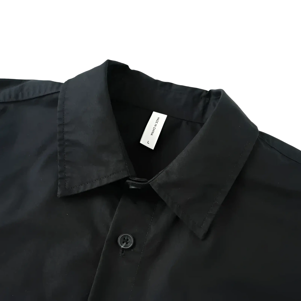 Men printed casual long sleeve shirt in black with a crisp collar and matching black buttons for everyday wear