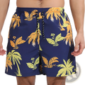 Men printed swim trunks in navy blue with vibrant tropical palm tree and leaf pattern for sports and beach use