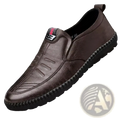 Brown leather slip-on men casual loafers with black rubber sole and stitched detailing for walking