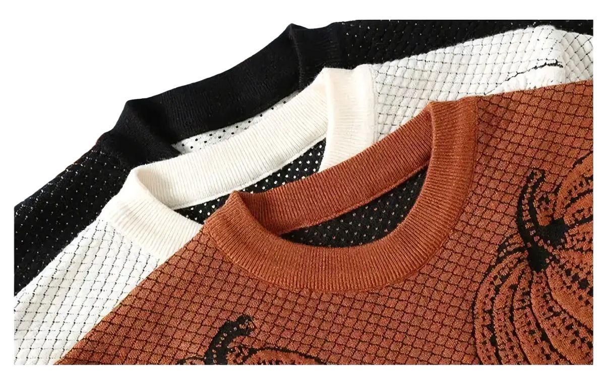 Men pumpkin knit sweater casual pullover in orange featuring a black pumpkin design and textured grid pattern with ribbed cuffs