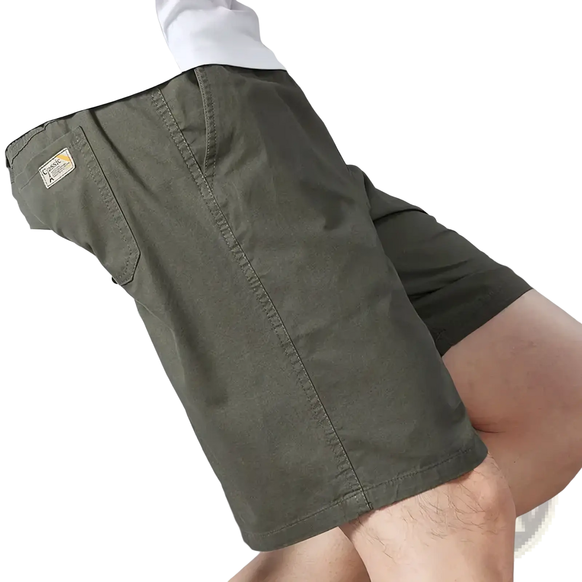 Men pure cotton casual loose summer shorts in olive green with a classic design and branded side pocket patch