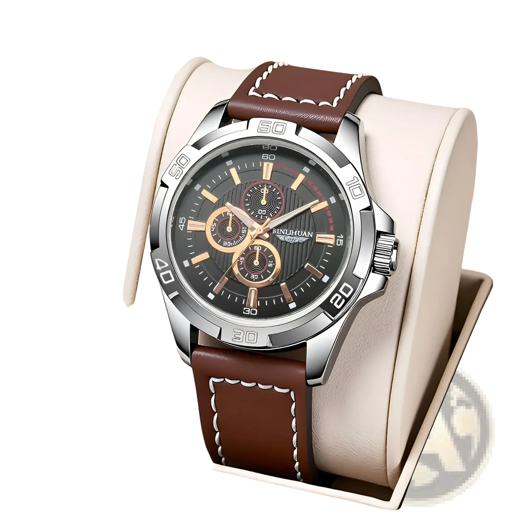 Men quartz chronograph watch with a sleek silver case black dial gold-tone hands and brown leather strap with white stitching