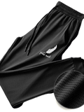 Men quick dry black mesh athletic jogger pants with white feather and gold rush embroidery on the thigh