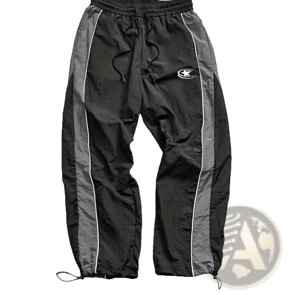 Men quick dry athletic track pants in black and gray with white piping, drawstring waistband, and adjustable cuffs
