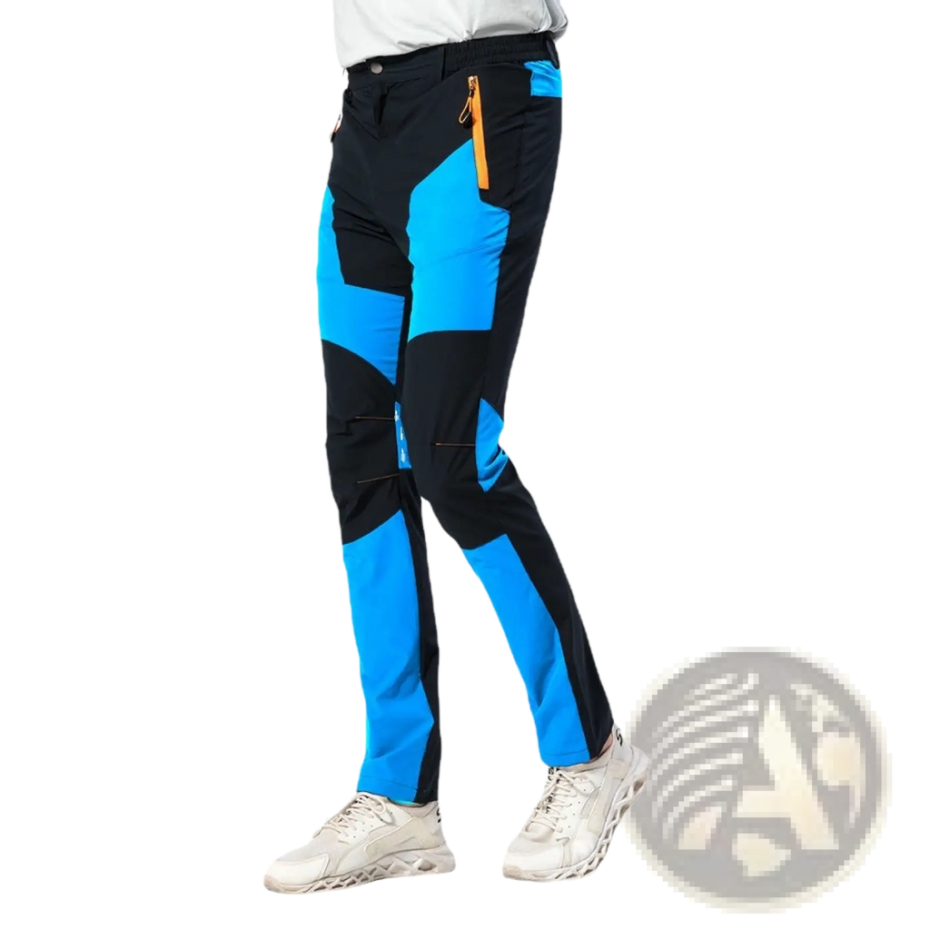 Men quick dry tactical hiking pants in black and bright blue with orange zipper accents for outdoor use