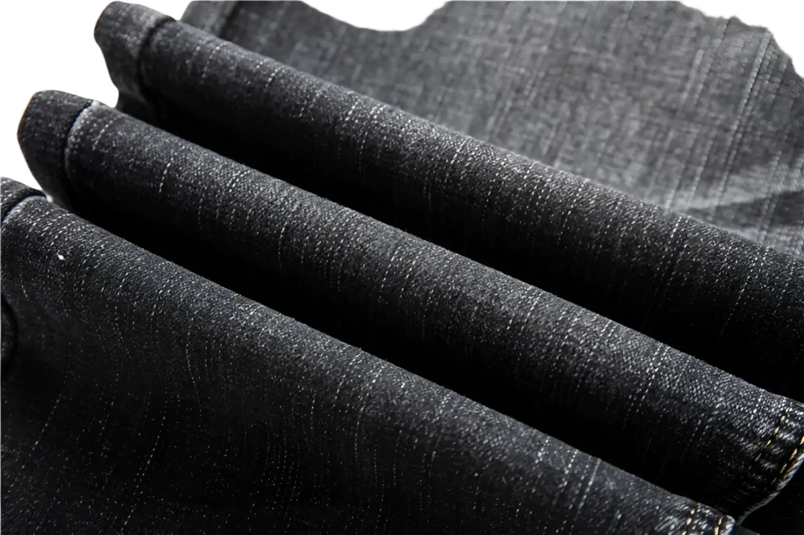 Men regular fit stretch denim jeans in dark wash with textured fabric and visible stitching on rolled cuffs