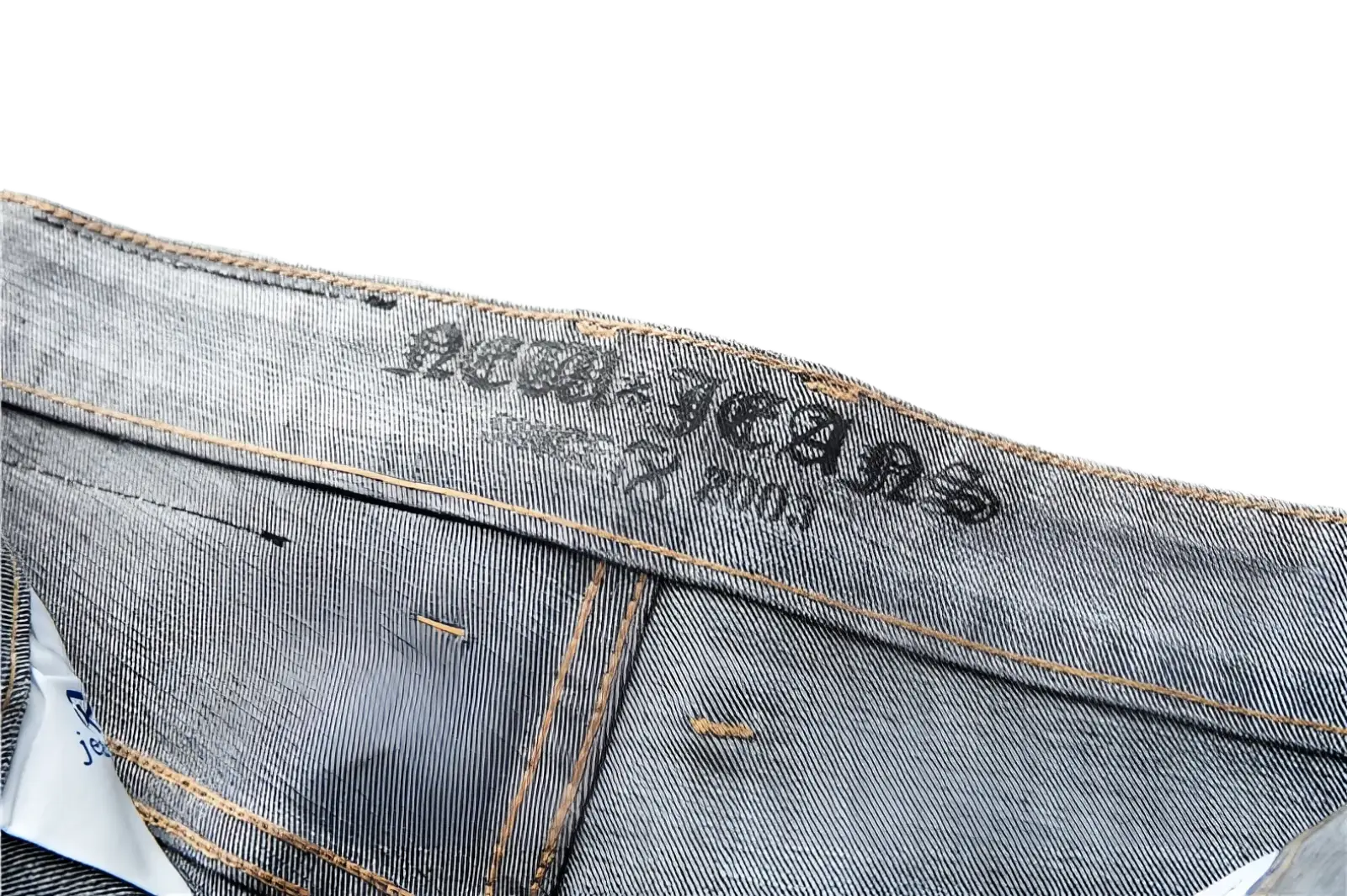 Men regular fit stretch denim jeans in grey with faded wash and brown stitching featuring jeans brand label embroidery