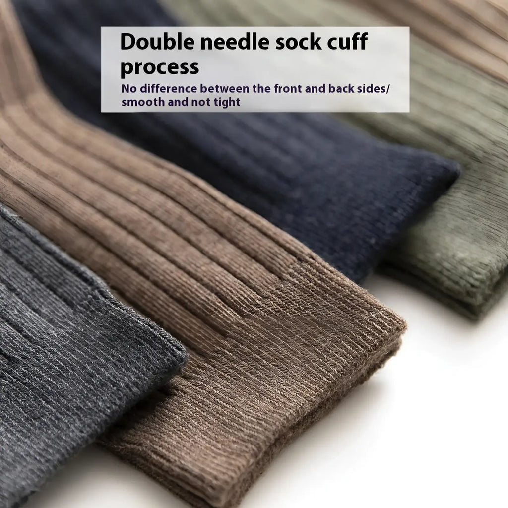 A set of men ribbed cotton socks in earthy neutral tones including beige navy blue olive green and gray