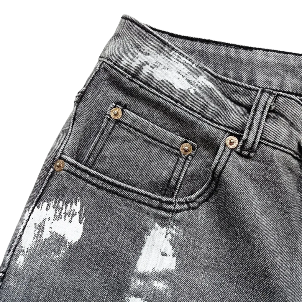 Men ripped skinny jeans distressed black denim with white paint splatter and gold-tone button fastenings