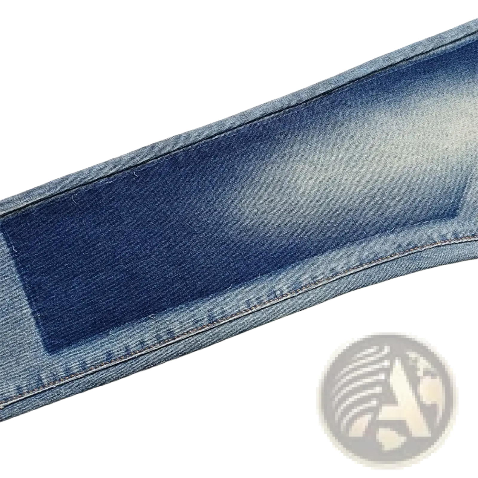 A close-up of men ripped skinny jeans distressed retro wash blue denim fabric with visible stitching and a dark patch
