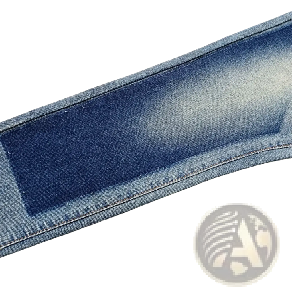A close-up of faded blue denim in men ripped skinny jeans showing distressed retro wash and visible stitching