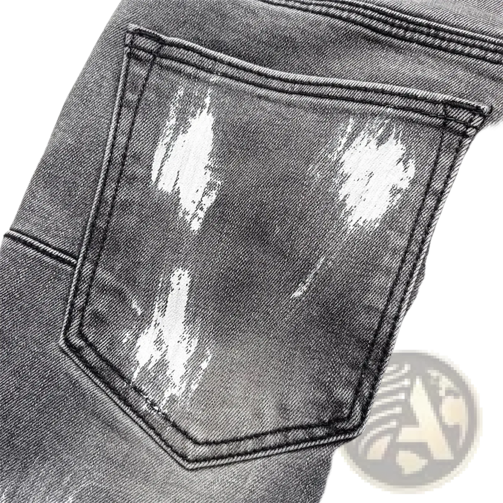 Men ripped skinny jeans distressed retro wash blue featuring faded gray denim back pocket with white paint splatter accents