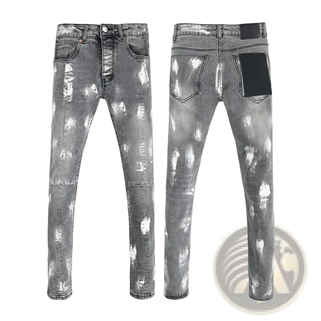 Back side of men ripped skinny jeans in distressed gray denim with faded paint splatter and black pocket patches