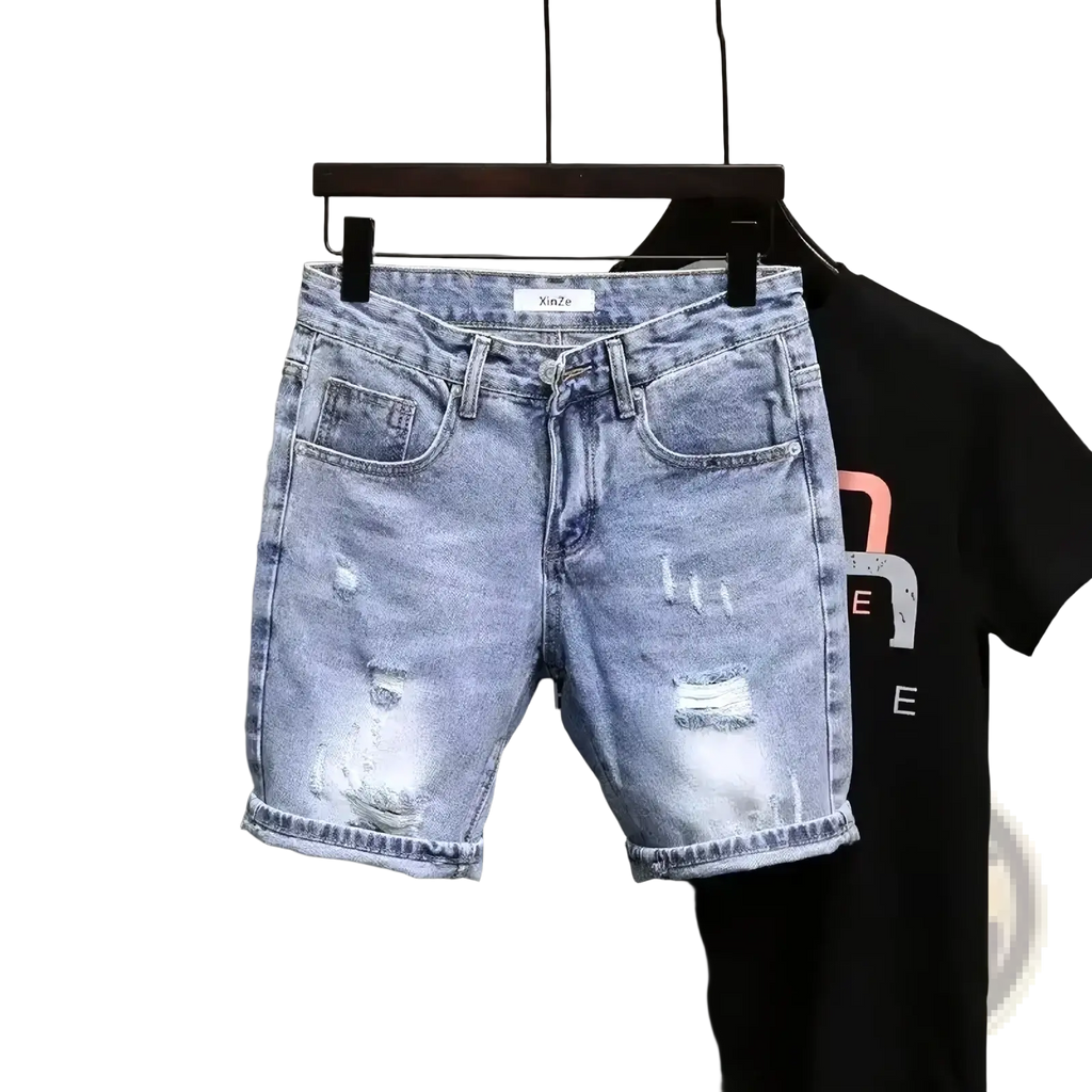 Men ripped slim fit denim shorts in light-wash with distressed ripped details and rolled cuffs made of denim material