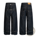 Men rivet wide leg raw denim jeans in dark indigo with multiple pockets and silver rivets along seams