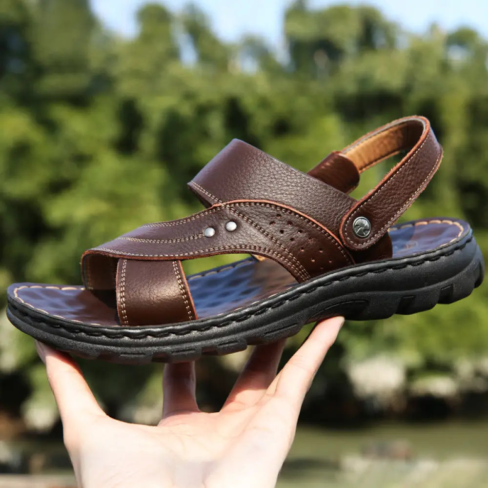 Men’s adjustable genuine leather summer beach sandals in brown with sturdy black rubber sole and adjustable strap design