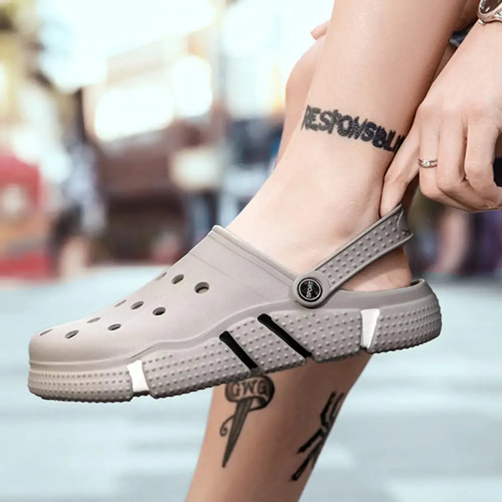 Gray breathable waterproof eva men beach clog sandal with black accents and textured rubber sole front view
