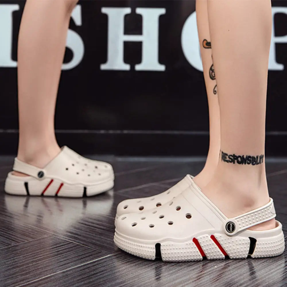 Men breathable waterproof eva beach clogs in white with red and black striped sole accents viewed from the back
