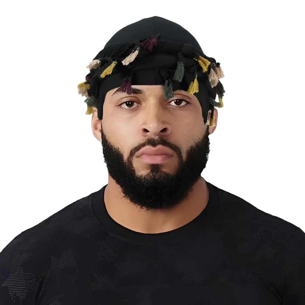 Men satin lined beard twist cap in black with colorful yellow green and purple tassels shown from the back side