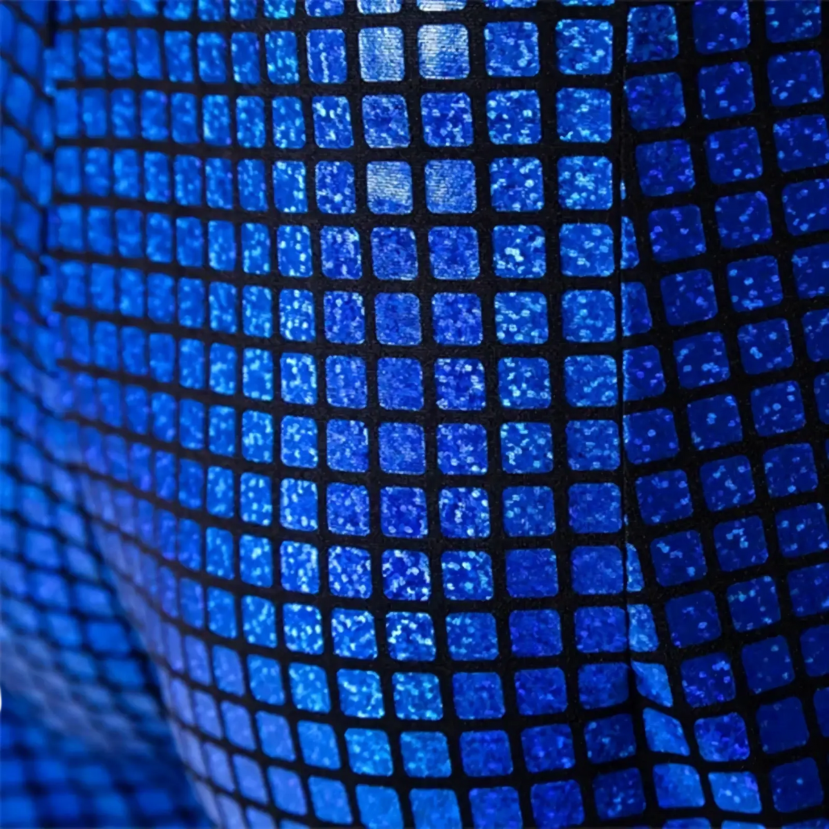 Men sequined checkered suit pants in blue glittery mosaic tile fabric with a shimmering grid pattern for parties