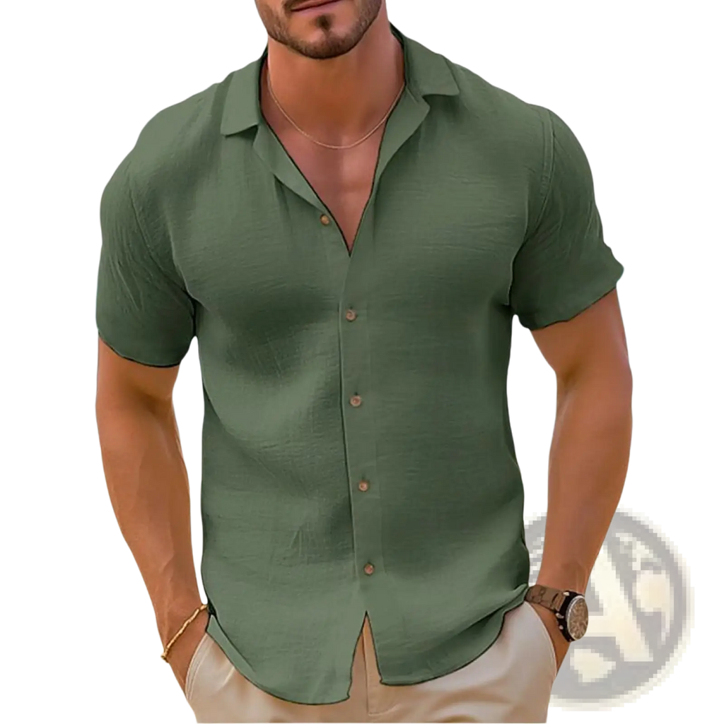 A man wearing a slim fit olive green short sleeve button down shirt with subtle texture for casual beachwear