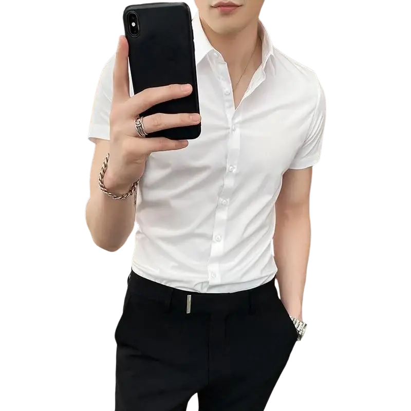 White short sleeve dress shirt with a crisp tailored fit and subtle pleats at the collar made from cotton blend