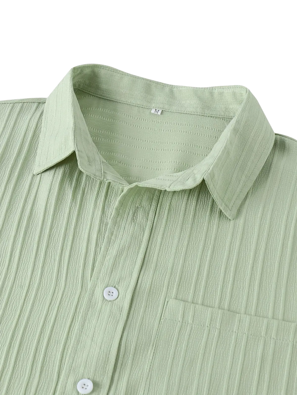 Men short sleeve textured beach shirt in light green with a crisp collar white buttons and subtle fabric texture