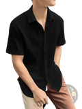 Men short sleeve textured casual shirt in black with a subtle woven pattern suitable for everyday wear