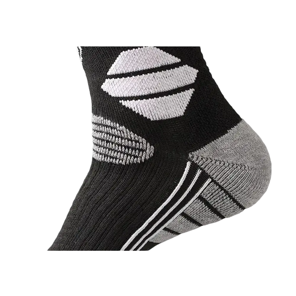 Black men ski socks featuring excellent thermal compression with white and gray accents and a u-shaped heel design