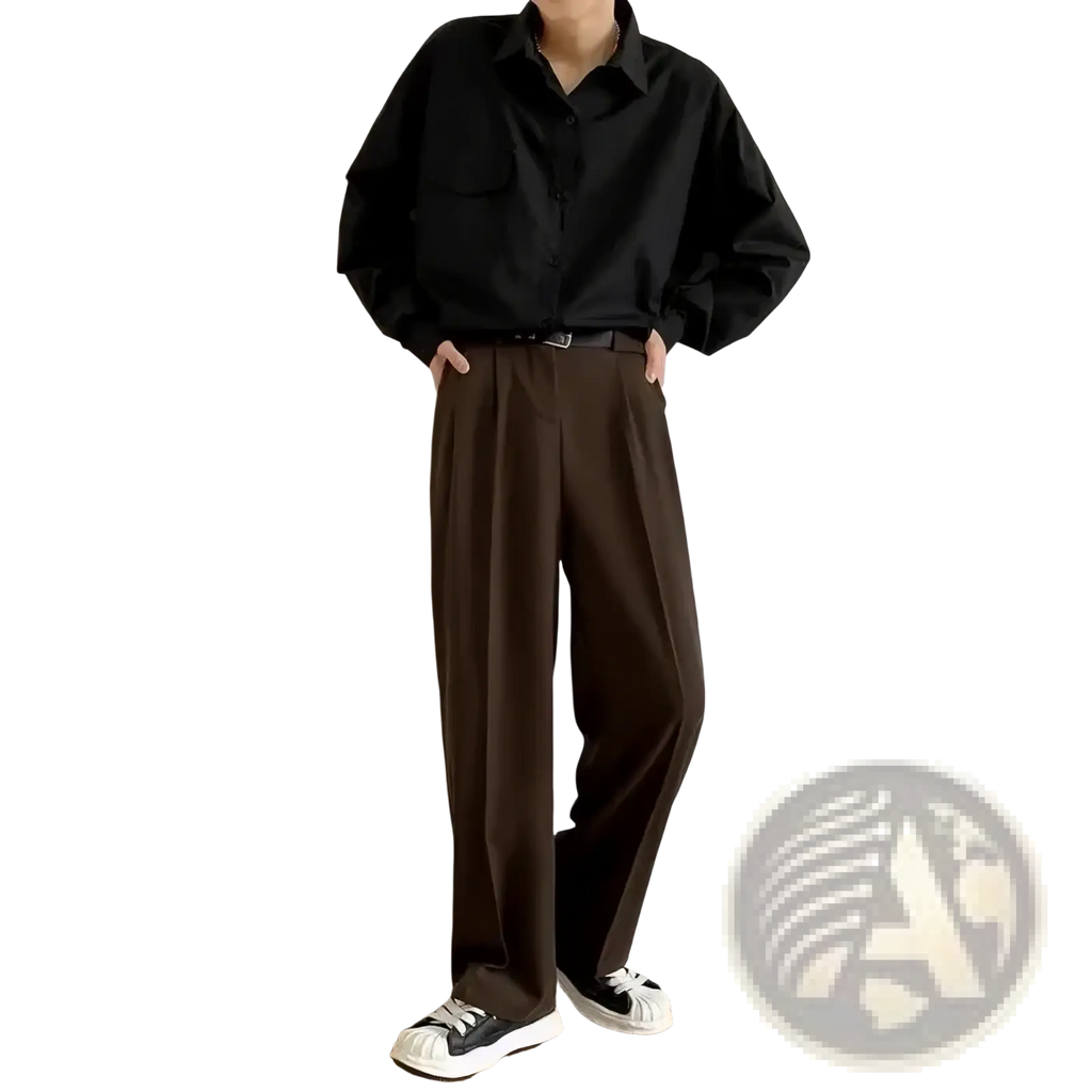 Black oversized button-up shirt with long sleeves and collar paired with men slim fit dress pants for smart casual wear