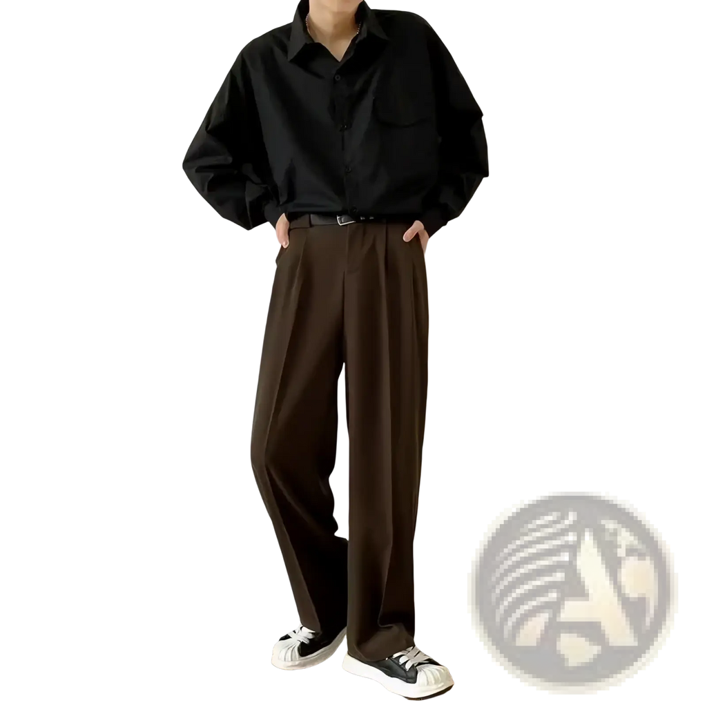 Black oversized button-up shirt with long sleeves and classic collar paired with men slim fit dress pants