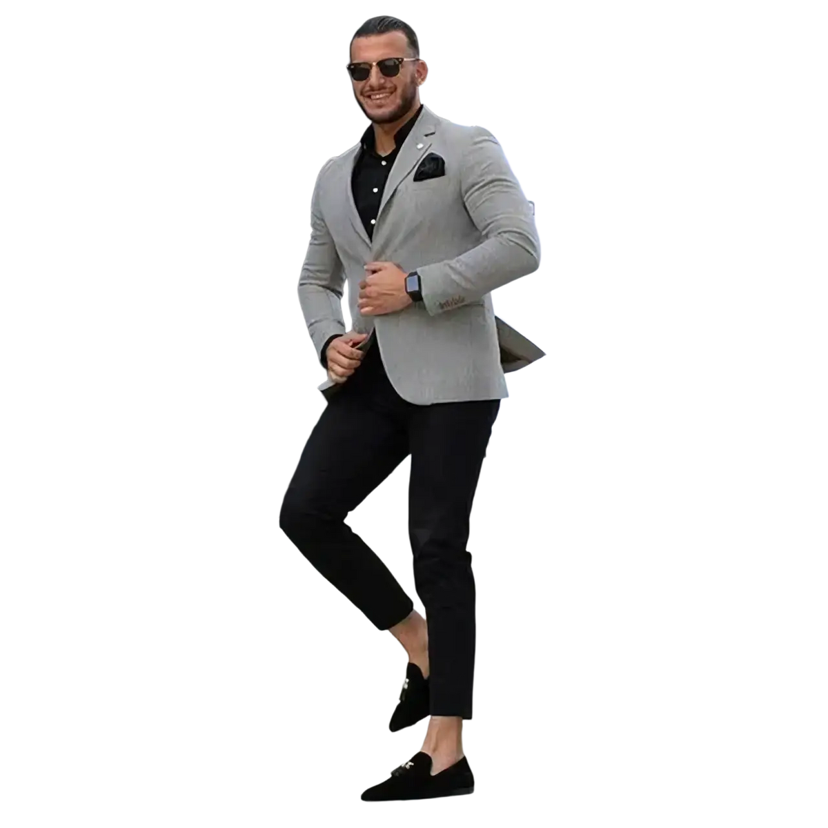A man wearing a men slim fit gray business suit set with a light gray blazer over black dress pants and suede loafers
