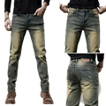 Men slim fit green denim jeans featuring distressed blue denim with faded legs and classic five-pocket design