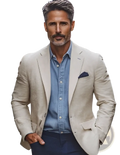 Men slim fit printed suit jacket in beige textured fabric with subtle sheen worn over blue shirt and dark trousers
