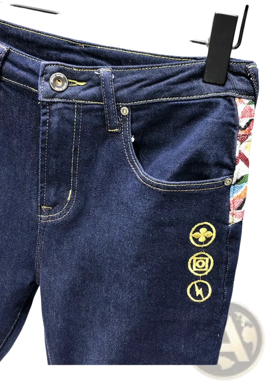 Men slim fit stretch dark blue denim jeans with gold embroidered logos and colorful patterned side seam patch