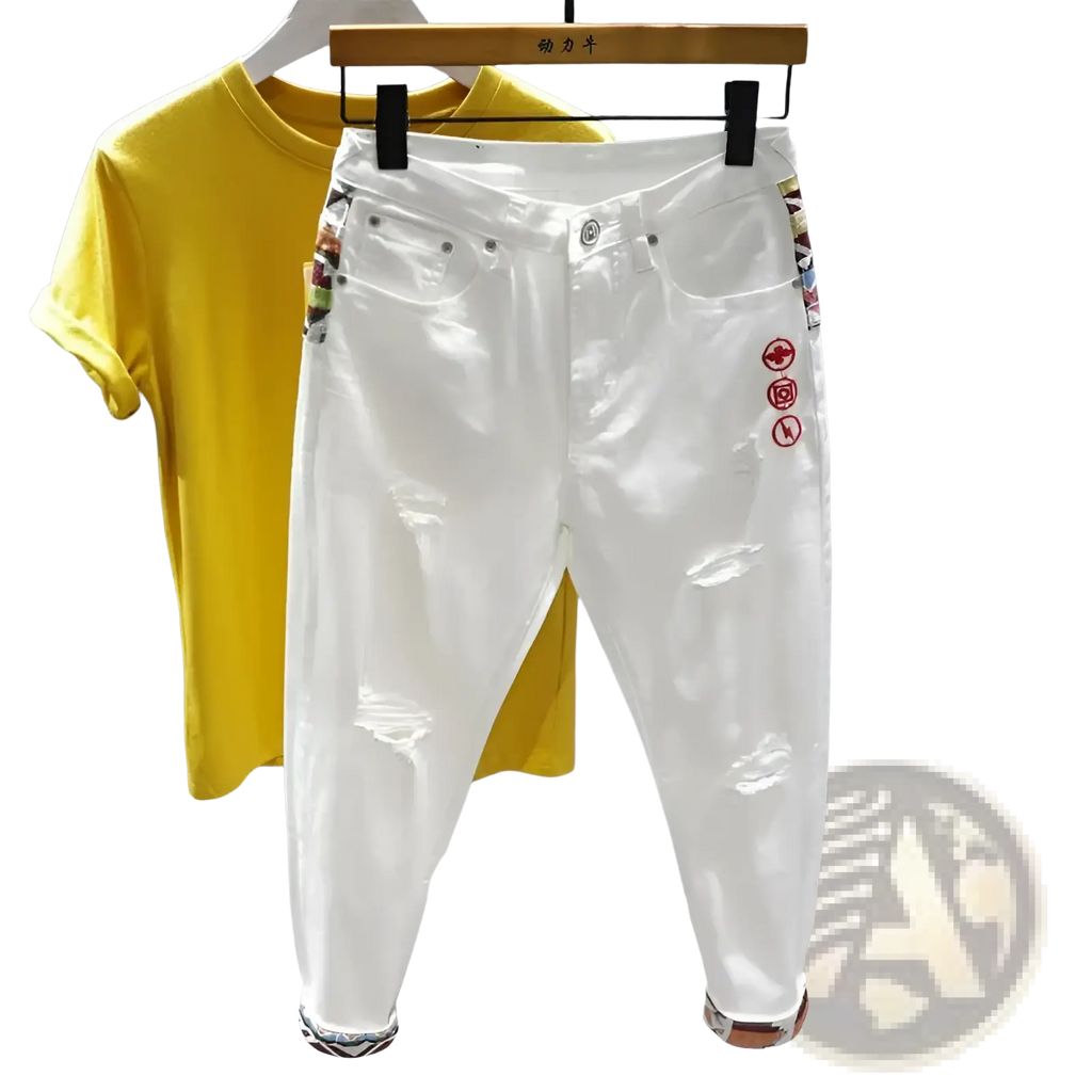 Men slim fit stretch white denim jeans with distressed details colorful patterned side panels and red thigh embroidery
