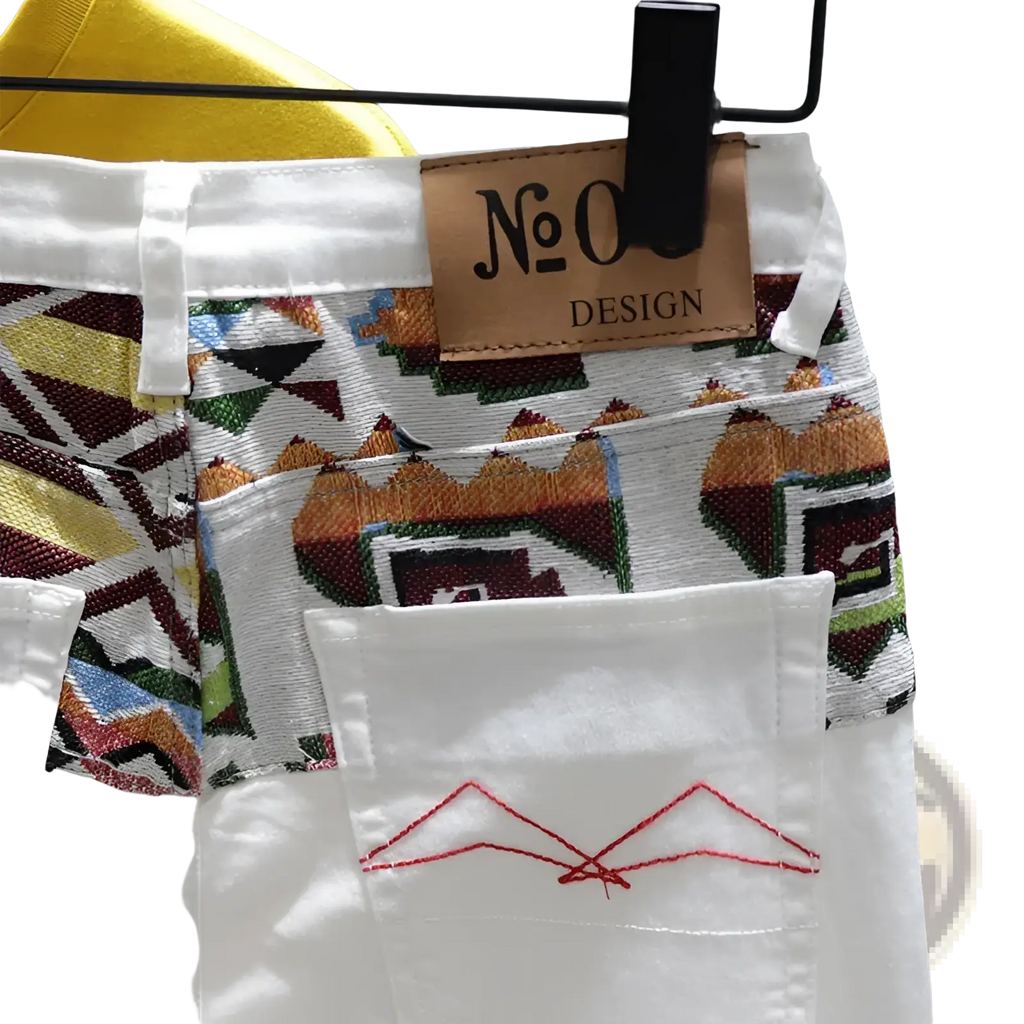 Men slim fit stretch embroidered white denim jeans with vibrant geometric waistband and red mountain pocket embroidery