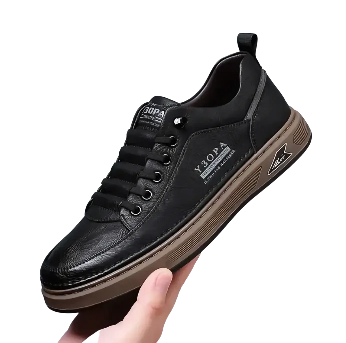 Men slip on casual sneaker in black leather with tan rubber sole and y30pa branding on the side