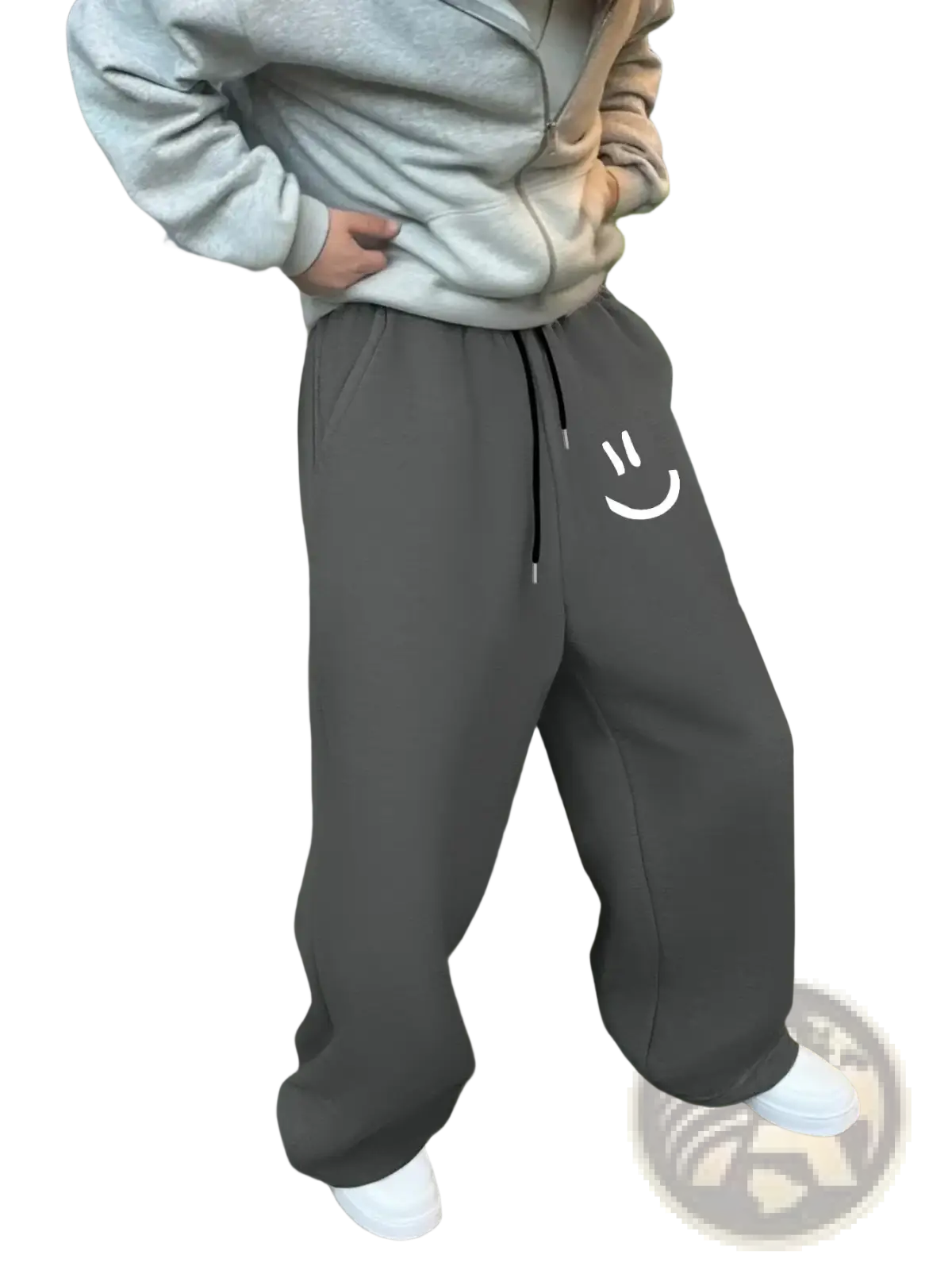 Men smiley face fleece sweatpants in gray with a white smiley graphic on the left leg and black drawstrings