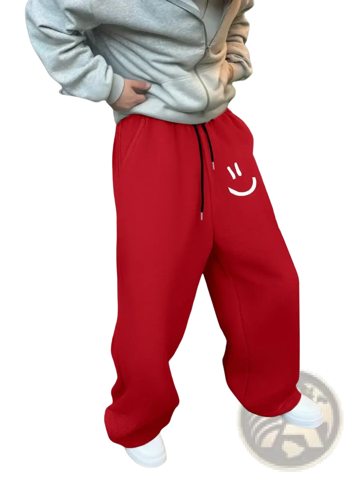Men smiley face fleece sweatpants in red featuring a white smiley face graphic on the left leg and black drawstrings