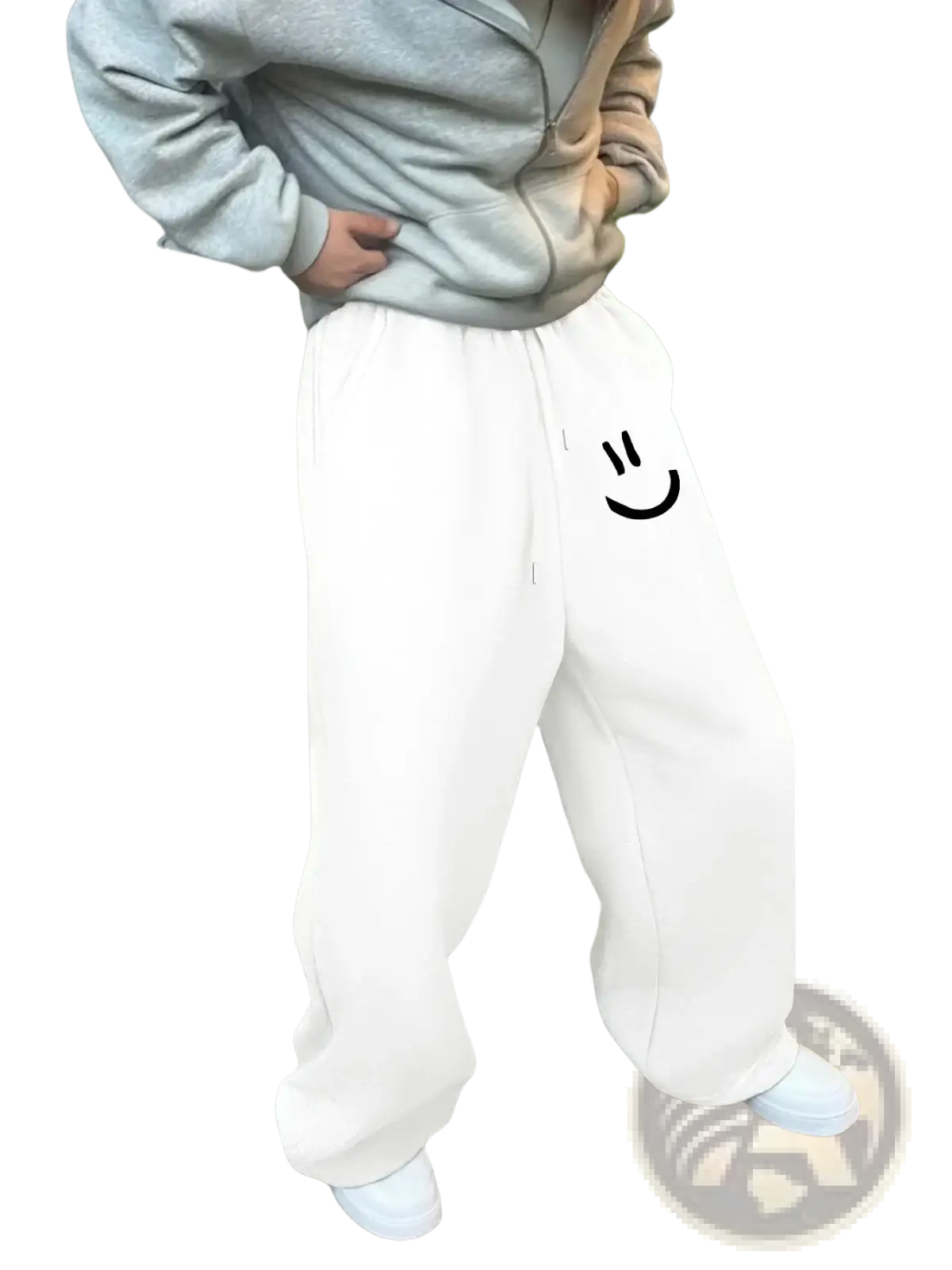 Men smiley face fleece sweatpants in white with loose fit and black smiley face graphic on the left thigh