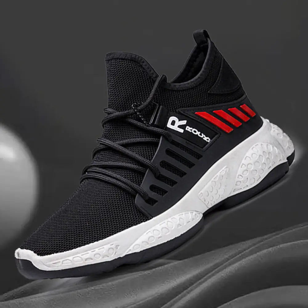 Men’s breathable mesh athletic sports sneakers in black with red stripes and white textured sole for sports use