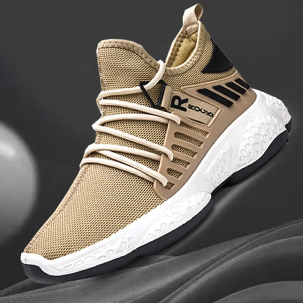 Men’s breathable mesh athletic sneaker in tan with black accents and white rubber sole for sports use