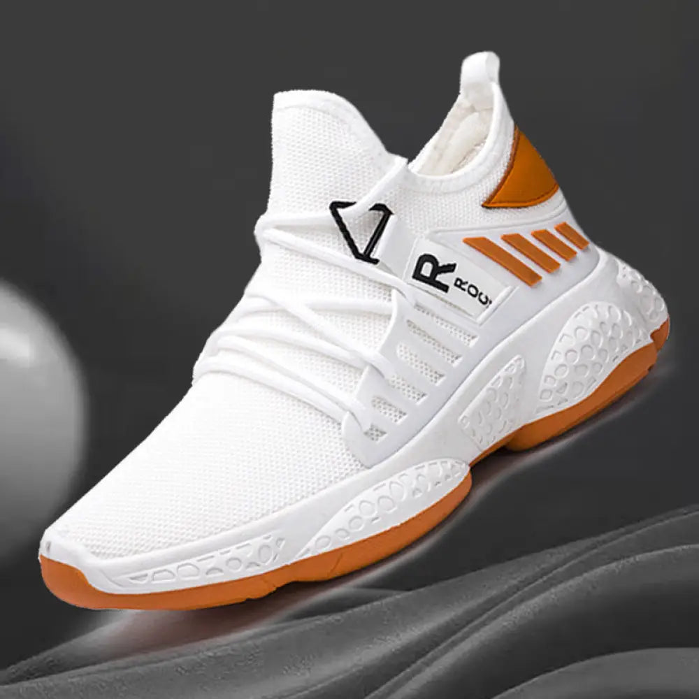 Men’s breathable mesh athletic sports sneakers in white and orange with a textured rubber sole and black logo detailing