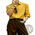 Men striped casual long sleeve shirt in yellow with thin white vertical stripes and rolled sleeves for a relaxed look