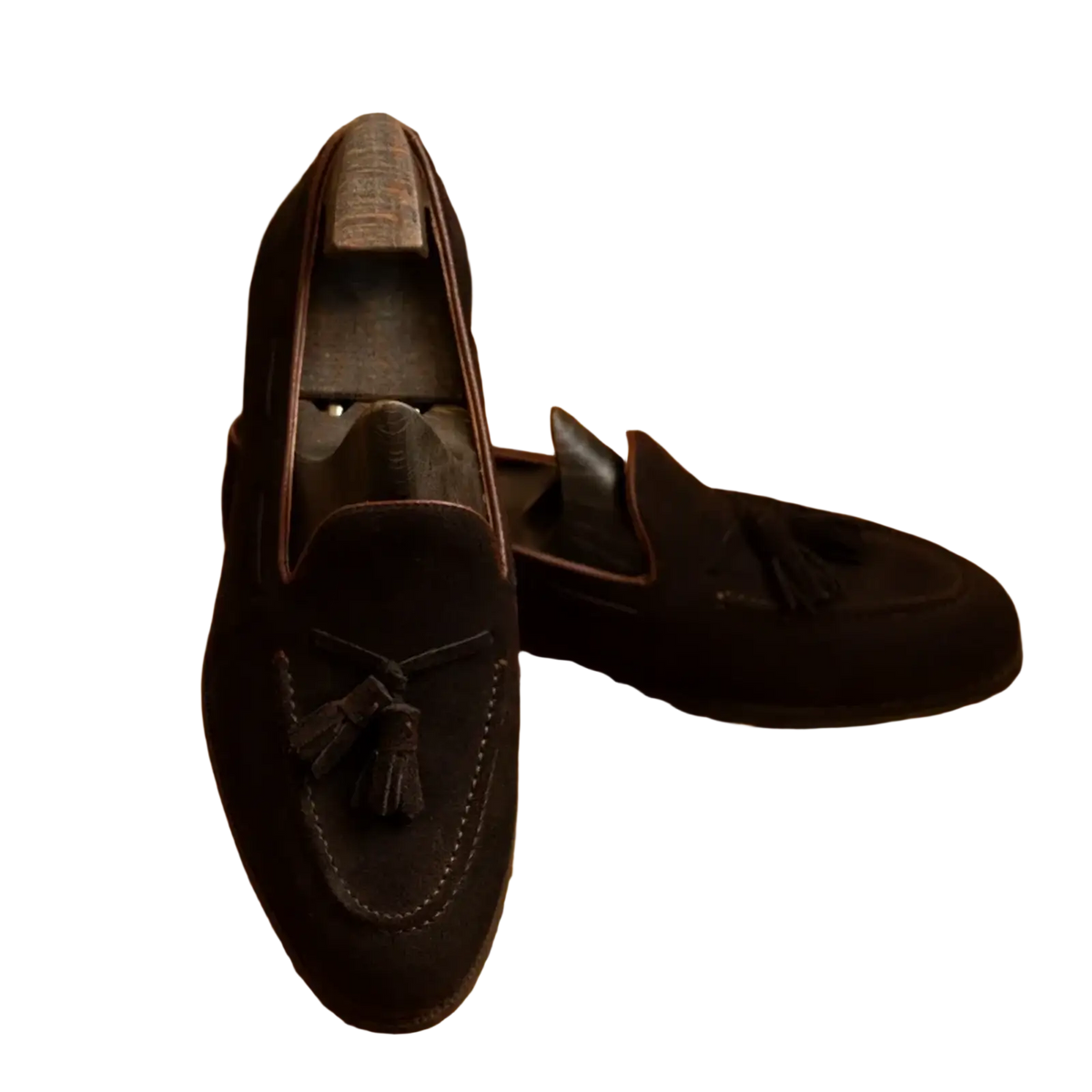 Men suede tassel loafers in black suede with contrasting brown stitching and a classic slip on casual design