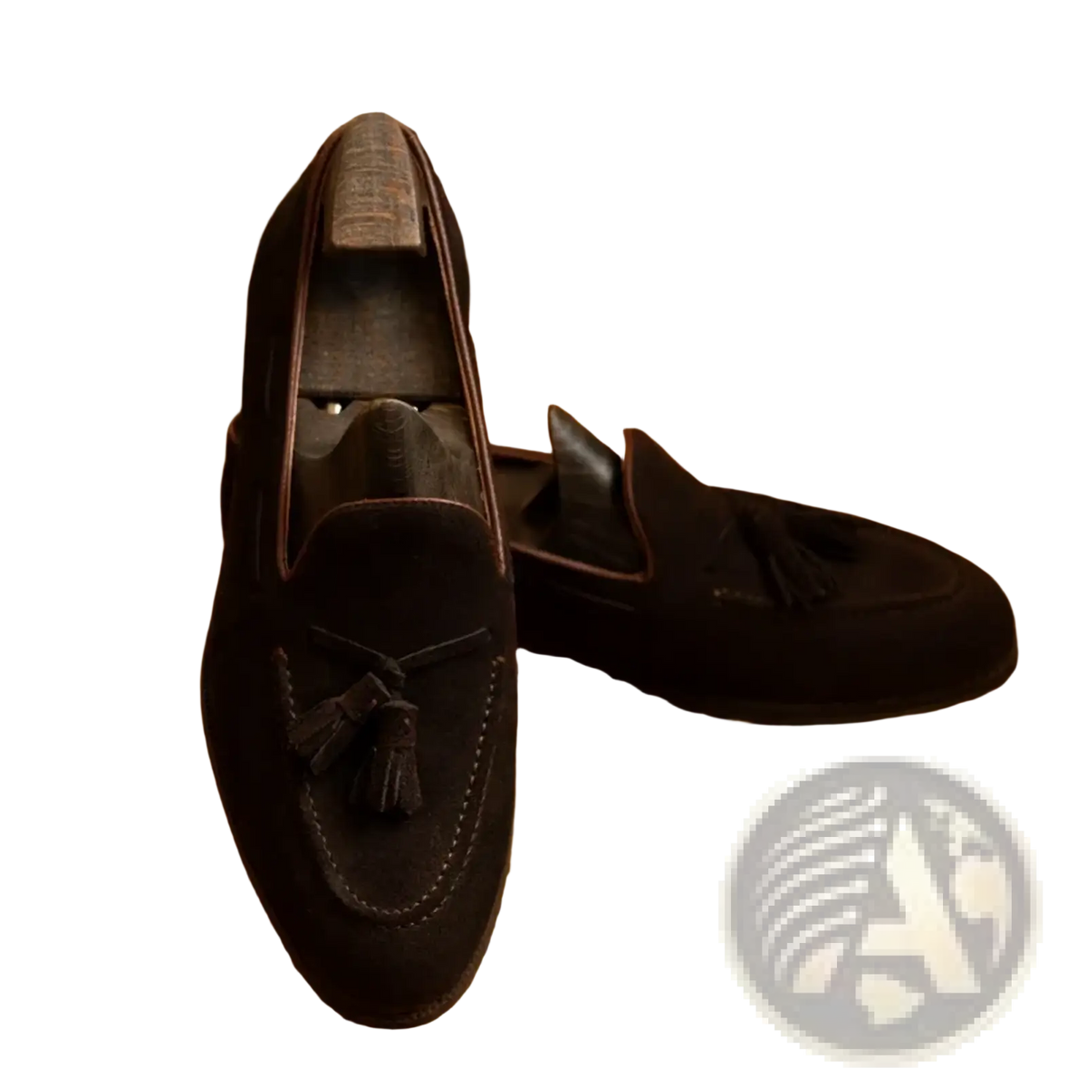 Men suede tassel loafers in black suede with contrasting brown stitching and a classic slip on casual design