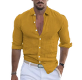 A mustard-yellow men summer beach cotton shirt with single breasted design and relaxed fit with rolled cuffs