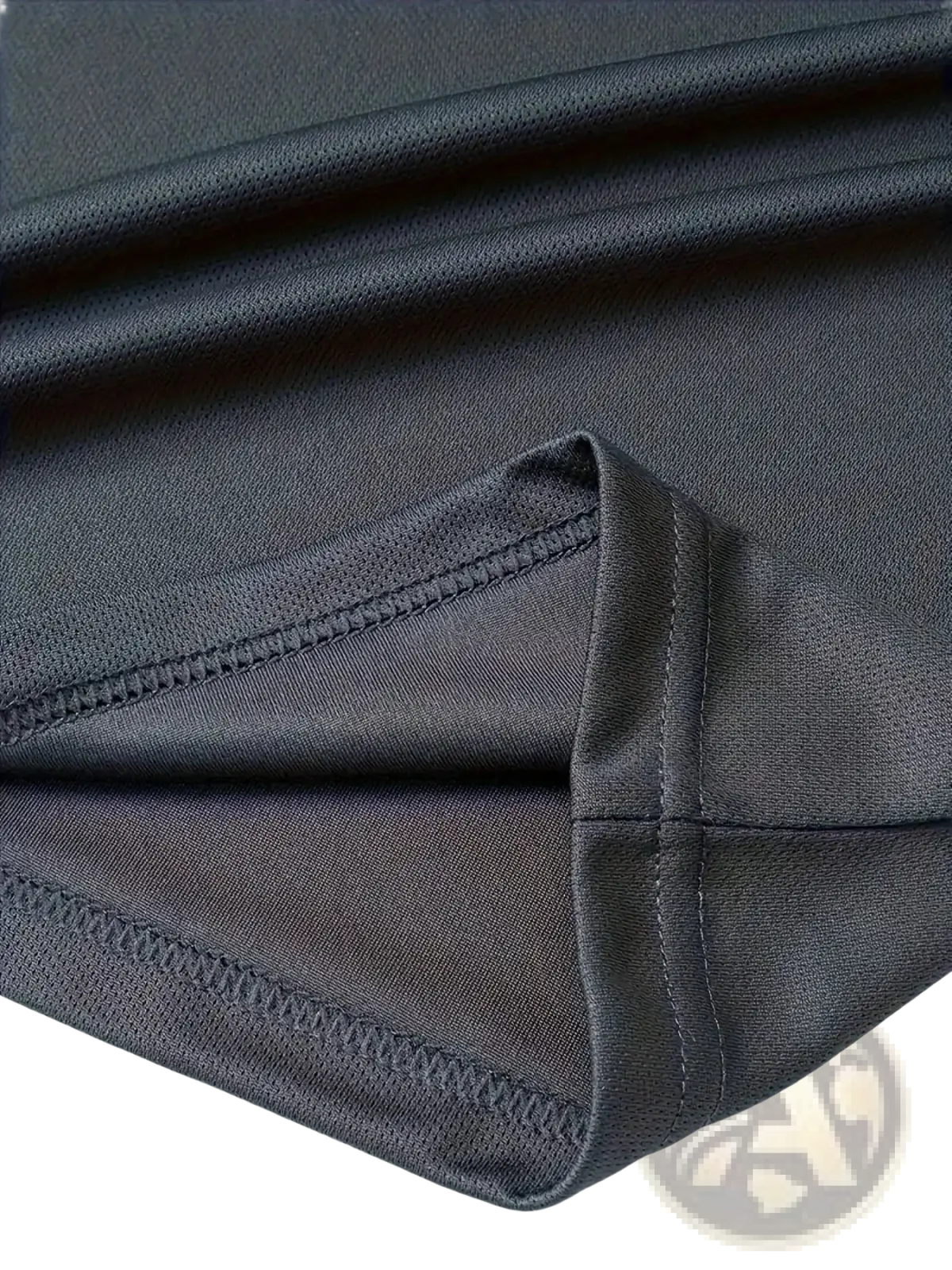 Black mesh fabric with smooth textured surface and stitched edges for men summer sportswear quick dry fitness outfit